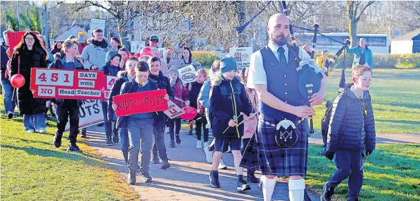  ?? ?? Successful protest Chryston Primary pupils and families held a demonstrat­ion in their area over the joint headship plans