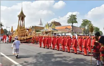  ?? The Associated Press ?? The funeral procession of late Thai King Bhumibol Adulyadej begins this morning in Bangkok.