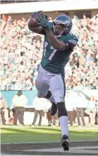  ??  ?? Alshon Jeffery scores against his old team. BILL STREICHER/USA TODAY SPORTS