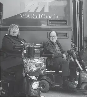  ?? CHRIS YOUNG / THE CANADIAN PRESS FILES ?? Martin Anderson and Marie Murphy, both of whom have cerebral palsy, have been locked in a long-standing battle with Via Rail over its accessibil­ity policies.