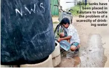  ??  ?? Water tanks have been placed in Kalutara to tackle the problem of a scarecity of drinking water
