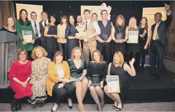  ?? PICTURE BY GRAHAM FRANKS ?? Chestnut Tree House Business Awards 2019 winners on stage with hosts Allison Ferns and Ambrose Harcourt