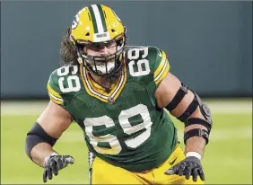  ?? Jeffrey Phelps / Associated Press ?? Offensive tackle David Bakhtiari was a key part of the Packers scoring an Nfl-best 31.6 points per game and winning back-to-back division titles.