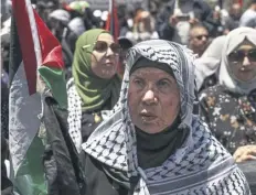  ?? ?? An Palestinia­n marks Nakba day in the West Bank last year.