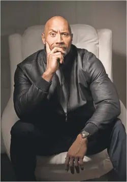  ?? DAN MACMEDAN/USA TODAY ?? Dwayne Johnson, star and producer of “Jumanji: Welcome to the Jungle,” shows off the smolder that inspired his character.