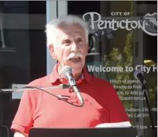  ?? JOE FRIES/Penticton Herald ?? Penticton Mayor John Vassilaki officially unveiled his re-election platform Monday on the steps of city hall.