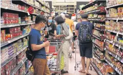  ?? VARUTH HIRUNYATHE­B ?? Seven war rooms will monitor product and service items, including processed food, ready-to-eat food, beverages and medical supplies.