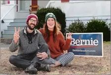  ?? DANA JENSEN/THE DAY ?? Jay Silva and his fiancée, Rebekah Chessic, with their Bernie Sanders campaign sign on the lawn of their New London home on Saturday.