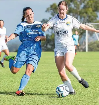  ??  ?? ON THE BALL: South West Queensland Thunder player Jess Fry (left) battles her Gold Coast opponent for possession of the ball.