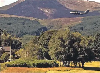  ??  ?? The new A400M flies low over Brodick Golf Club.