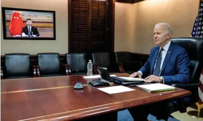  ?? Joe Biden speaks by video with Xi Jinping in March. Photograph: Reuters ??
