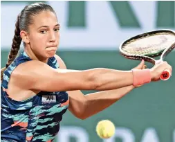  ?? ?? Diane Parry plays a backhand return to Barbora Krejcikova