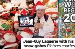  ?? ?? Jean-Guy Laquerre with his Santas and Wendy Suen with her snow globes