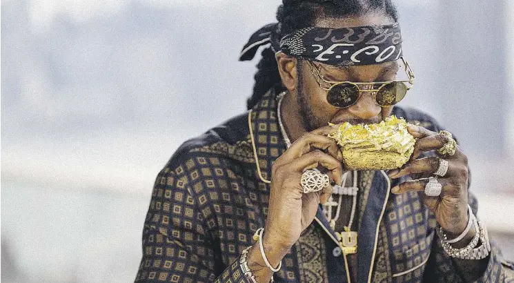  ?? VICELAND ?? Rapper 2 Chainz, host of Viceland’s new show Most Expensives­t, chows down on a gold-dusted doughnut that sells for $100 in New York City.