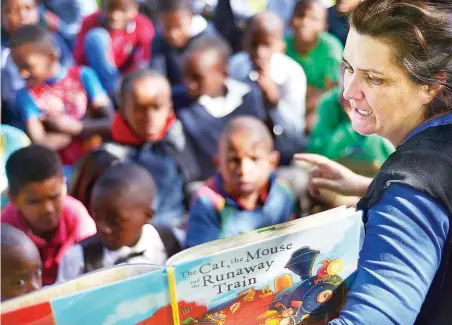  ?? PICTURE: ARMAND HOUGH/AFRICAN NEWS AGENCY (ANA) ?? LIFE LESSON: Margaux Bergman, a librarian, reads to the Grade 2 and 3 pupils from the Zonneblom Boys’ School. Stories feed children’s minds and imaginatio­ns, says the writer.