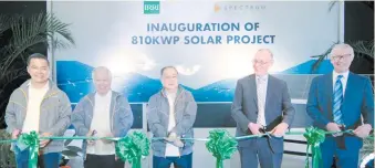  ??  ?? Executives from Spectrum, Meralco, and the Internatio­nal Rice Research Institute (IRRI) prepare to cut the ribbon to officially inaugurate IRRI’s Los Banos, Laguna solar panel system. From left are: Spectrum President Rain Reyes, Spectrum Chairman and...