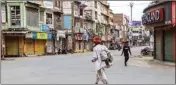  ?? PTI ?? Deserted streets amid restrictio­ns following the murder of tailor Kanhaiya Lal on Tuesday