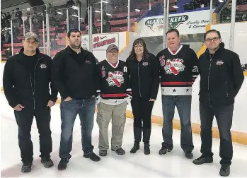  ?? KIMBERLEY BULLETIN/BLACK PRESS ?? From left, Kimberley Dynamiters president James Leroux, donor Mike Gould, Gould’s step-brother Duane Johnson, Dynamiter board members Karrie Hall, Al Rice and Troy Pollock.