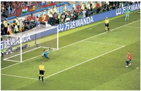  ?? GETTY IMAGES ?? Hero of the day:
Russian goalkeeper Igor Akinfeev saves the fifth penalty from Iago Aspas of Spain in the shoot out during the
2018 World Cup.