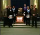  ?? COLIN AINSWORTH — DIGITAL FIRST MEDIA ?? Masonic brothers stand beside the warrant of Chester Lodge #236. Pictured from left are: Greg Desrosiers; Charles Monteith Sr.; Chester Lodge Secretary and Past Master Steve Beddow; Joe Walls; David J. Coffman; Chester Lodge Warden Michael Pessagno Jr.; Aaron Loyack; and Bob Trader Jr.