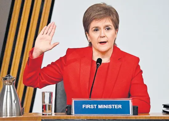  ??  ?? SWEARING BY IT: Nicola Sturgeon gives evidence to the Scottish Government inquiry into the handling of harassment complaints.