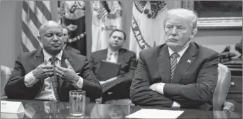  ?? AP FILE PHOTO ?? U.S. President Donald Trump listens as Indiana Attorney General Curtis Hill speaks during a meeting with state and local officials to discuss school safety in the Roosevelt Room of the White House in Washington.