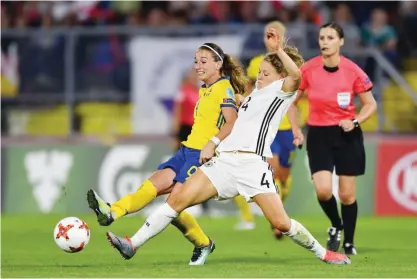  ??  ?? BREDA: Leonie Maier (R) of Germany vies with Kosovare Asllani (L) of Sweden during the UEFA Women’s Euro 2017 football tournament between Germany and Sweden at Rat Verlegh Stadium in Breda city on Monday. — AFP