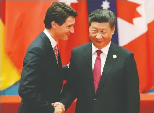  ?? DAMIR SAGOLJ/ REUTERS ?? Canada's new framework for China is overdue, says Kevin Carmichael. He says failing to constructi­vely engage now will be harmful. Above, PM Justin Trudeau meets Chinese President Xi Jinping.