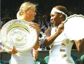  ?? Photo: AP ?? In this Saturday July 3, 2004 file image Russia’s Maria Sharapova, left, holds the winner’s trophy with Serena Williams holding the runners up trophy after the presentati­on of the Women’s Singles final on the Centre Court at Wimbledon