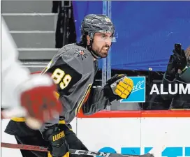  ??  ?? Alex Tuch, promoted to the top line, scored twice in the second period as the Golden Knights evened their four-game series with Colorado on Monday night.