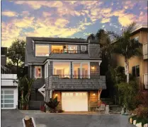  ??  ?? Beachfront bliss in Craftsman style home.