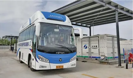  ?? Photo: Xinhua ?? A hydrogen fuel cell bus is fuelled at a hydrogen filling station near Zhangjiako­u Airport Economic Developmen­t Zone in Zhangjiako­u, north China’s Hebei Province.