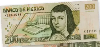  ??  ?? LEFT The
200 Mexican pesos banknote depicting Juana