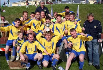  ??  ?? Rosslare Rangers celebratin­g their Wexford Cup final win in Curracloe on May 15, 2005.