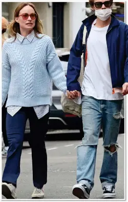  ?? ?? SOHO STROLL: Harry and Olivia, left, last week. Above right: The actress with her ex-husband Jason Sudeikis