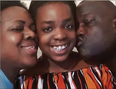  ??  ?? DEVASTATED: Belly Mujinga with her husband Lusamba Katalay and her 11-year-old daughter Ingrid