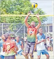  ?? Picture: JONACANI LALAKOBAU ?? Left: Ben Senivuga of Army 1 sets against Police 1 during the FMF Ratu Sukuna Bowl volleyball tournament at the National Netball Centre in Laucala Bay, Suva yesterday.