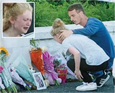  ??  ?? Heartbreak: Georgina Lochrane sobs as she and boyfriend George Horn read tributes