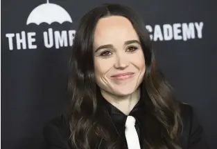  ?? JORDAN STRAUSS Jordan Strauss/Invision/AP ?? Elliot Page arrives at the Los Angeles premiere of "The Umbrella Academy" on Feb. 12, 2019.