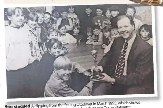  ?? ?? Observer in March 1995, which shows Star studded A clipping from the Stirling their hands on the Oscars statuette youngsters from Balfron Primary getting