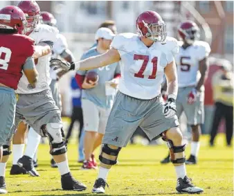  ?? KENT GIDLEY/ALABAMA PHOTO ?? Alabama redshirt junior Ross Pierschbac­her is part of a potentiall­y menacing left side of the Crimson Tide offensive line.