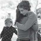  ??  ?? Nic (Chalamet) hugs his stepmom Karen (Maura Tierney) in “Beautiful Boy,” in theaters Oct. 12.
