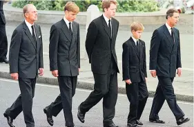  ??  ?? SOMBRE Philip, William, Earl Spencer, Harry & Charles walk behind Diana’s coffin, 1997