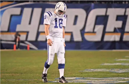  ?? ROBERT HANASHIRO, USA TODAY SPORTS ?? Peyton Manning leaves the field after the Colts lost a wild-card playoff game to the Chargers in overtime in January 2009.