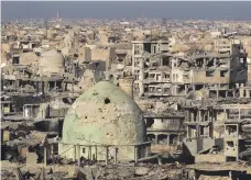  ?? AFP ?? Mosul’s Old City, six months after Iraqi forces liberated it from ISIL, shows the need for funding to repair the damage inflicted