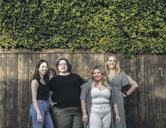  ?? Mariah Tauger Los Angeles Times ?? A SMALL rental complex brought together Ashley Wilkins, above left, Amanda Timpson, Cecilia RamirezTho­mpson and Lauren Terschluse, as well as Danae and Bill Horst, left. Below, Michelle Williams, left, and Nance Klehm found mutual support and a shared love of plants.
