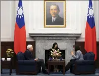  ?? (AP/Taiwan Presidenti­al Office) ?? Taiwan’s President Tsai Ing-wen (right) meets with Rep. Jack Bergman, R-Mich., in Taipei, Taiwan, on Thursday.