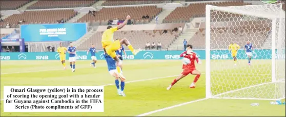  ?? (Photo compliment­s of GFF) ?? Omari Glasgow (yellow) is in the process of scoring the opening goal with a header for Guyana against Cambodia in the FIFA Series