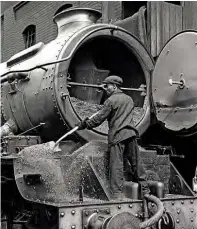  ??  ?? Left: The side of steam railways members of the public, and even many enthusiast­s, never saw: Shovelling char from the smokebox of ‘King’ No. 6012 King Edward VI at the end of its day’s work at Old Oak Common shed on July 3, 1960. Such thankless tasks still take place on heritage lines, of course, but usually after most visitors have gone home.