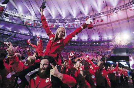  ?? DAVID GOLDMAN/THE CANADIAN PRESS/FILES ?? Athletes from Canada march in at the Maracana stadium at the 2016 Summer Olympics in Rio de Janeiro, Brazil in August of 2016. Canada proved in 2016 it could compete with the world’s top summer sport countries, with 22 medals at the Rio Games.